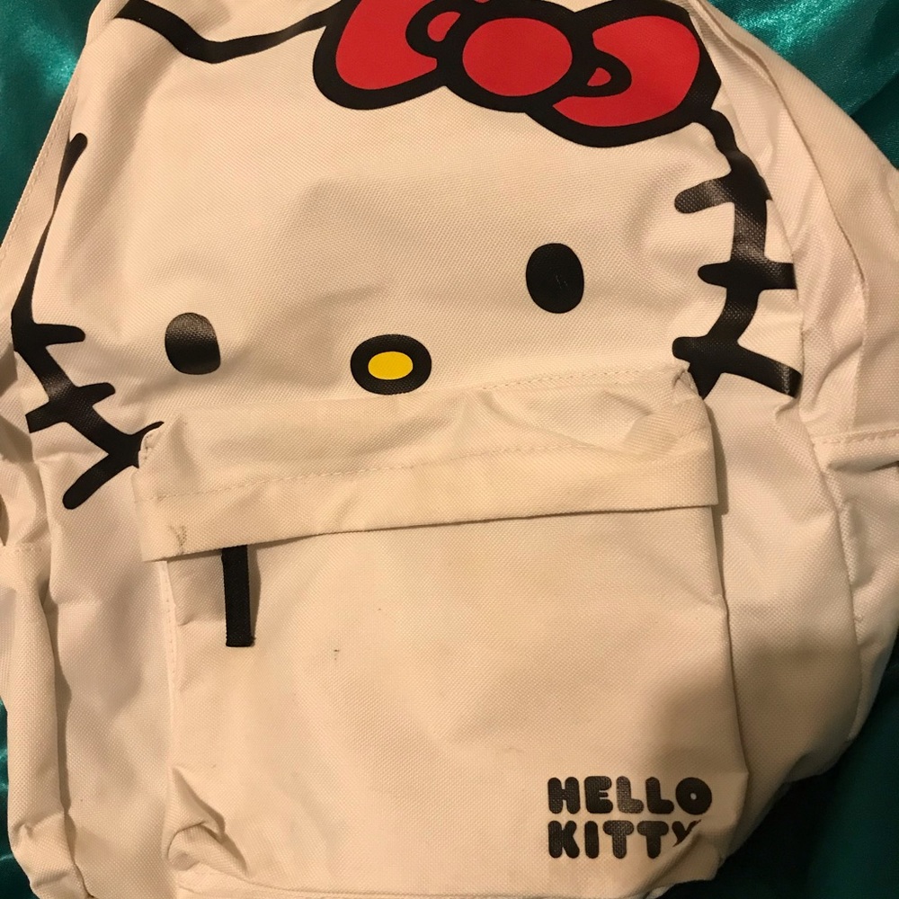 Hello kitty white regular size backpack with hoodie.